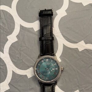 Stauer urban watch with teal face